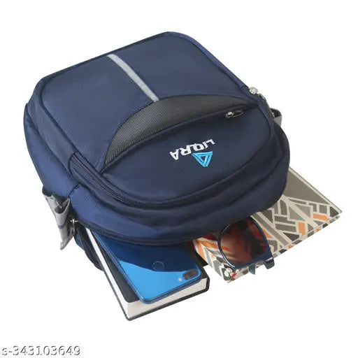 A blue unisex sling bag with a shoulder strap, featuring a closed main compartment and smaller front pocket