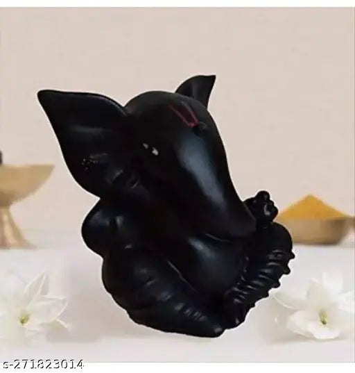 Black Ganesha showpiece, intricately crafted poly resin idol for car dashboard or living room decor
