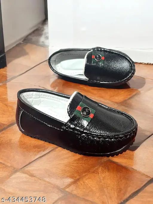 Black leather boys loafer with buckle closure