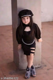 Black and white patterned girls' dress with cutouts