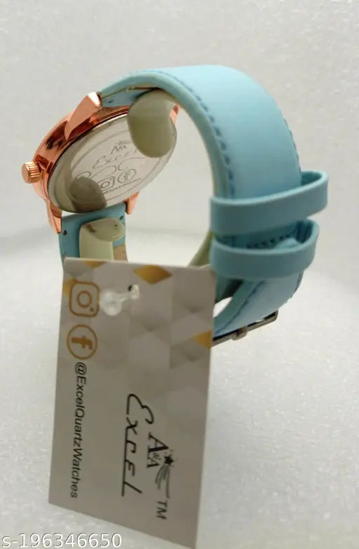 Rose gold watch with black band