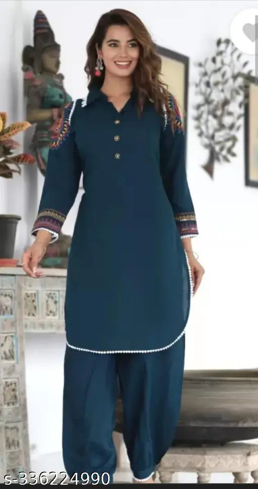 Rayon solid plus size ethnic kurta set in vibrant colors, featuring long sleeves and Palazzos bottomwear. Made in India