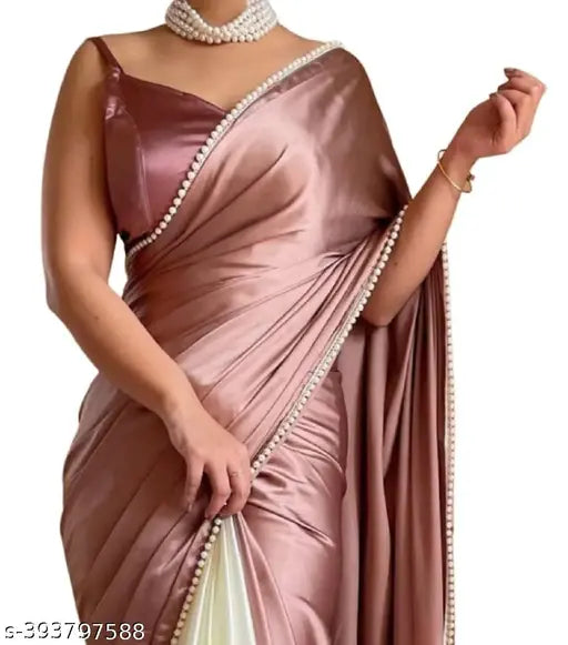 Pink satin saree with intricate lace border