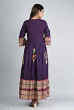 This is an image of a long, embroidered rayon kameez in blue