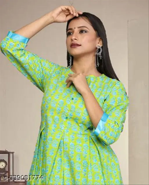 Parrot Rama Cotton Dress0101: Solid-colored, long-sleeved cotton kurta and palazzo set with box pleats, round neck, and show buttons. Available in various sizes for a comfortable fit. Indian cotton design