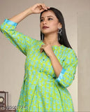Parrot Rama Cotton Dress0101: Solid-colored, long-sleeved cotton kurta and palazzo set with box pleats, round neck, and show buttons. Available in various sizes for a comfortable fit. Indian cotton design