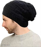 Black woolen beanie hat by Sulbha, featuring thermal spun acrylic knit and fur lining for extra warmth. Ideal for outdoor activities like skiing, snowboarding, camping, hiking, and winter holidays. Perfect for everyday wear with a unique wrinkled design that suits most outfits. Hand wash only. Made in India