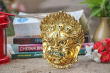 Golden metal face mask protecting from negative energy, evil eye charm, wall hanging, 6 inches, antique design