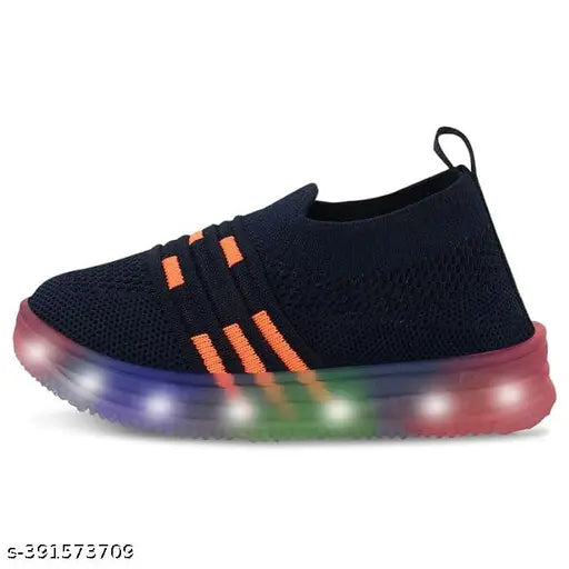 Red and black sports shoes with glow-in-the-dark accents for kids, featuring a mix of orange and red lighting