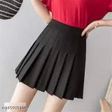 Cotton plaid high-waisted mini skirt for girls and women, solid net lining with shorts. School uniform skater style. Available in sizes 24-34 (waists 24"-34", lengths 17"). Made in India