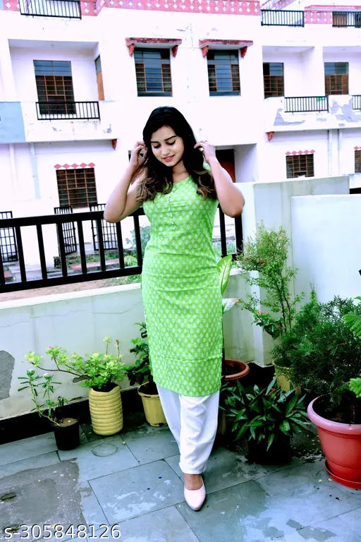 Green rayon sleeveless Kurta Palazzo set, printed net design, Indian ethnic wear on display