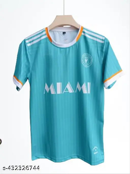 Green Messi Inter Miami latest jersey 2024/25, short-sleeved polypropylene soccer attire with printed design on chest, model wearing size M