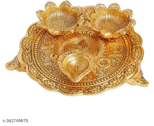 Multicolor brass pooja thali set with essential articles, gold-plated and vintage finish. Ideal for Aarti Pooja rituals during festivals or weddings. Made in India