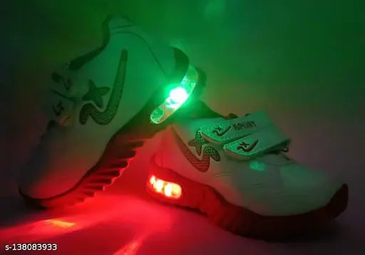 White sports shoes with green LED lights, black laces