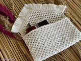 Handcrafted Bohemian cotton tassel tote, perfect for casual or beachwear styles