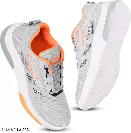 Grey knit sports shoe for kids, orange logo detail
