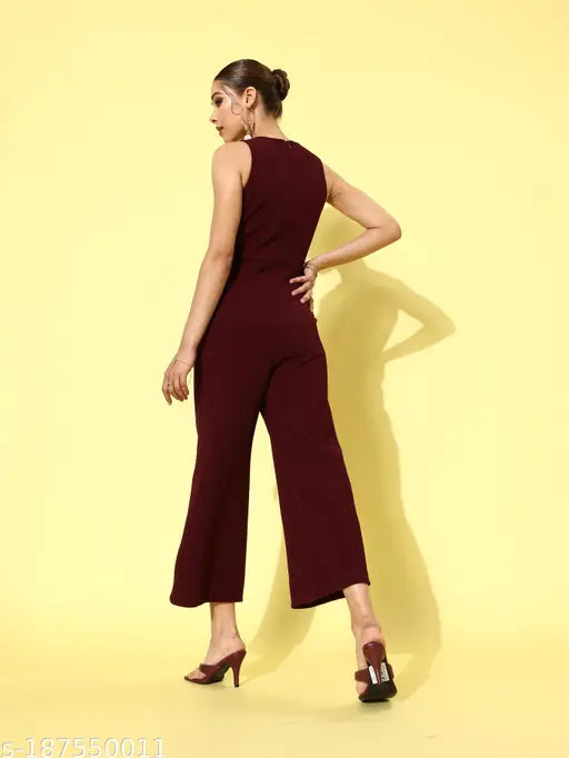Maroon polyester sleeveless v-neck jumpsuit by Miss Chase, featuring a metallic buckle strap and asymmetrical front flap