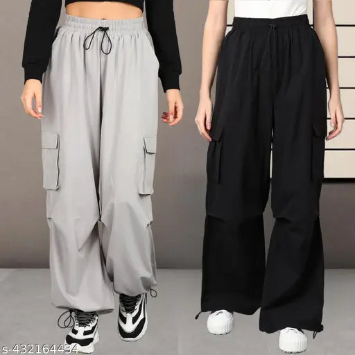11 Stylish NS PantGreyBlack: Wide-leg, black & grey cargo pants with drawstring waist, visible pockets.