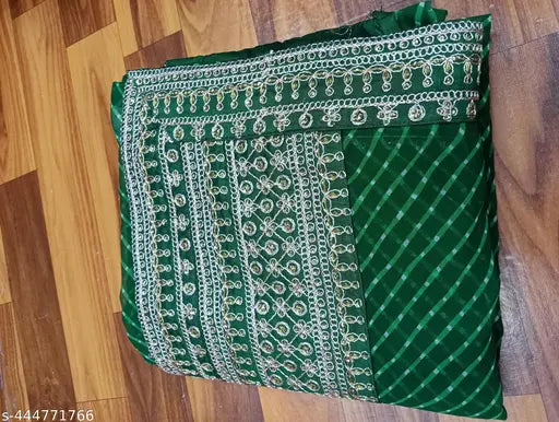 Green and beige embroidered saree with fringe ends