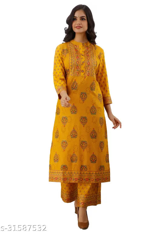 Yellow gold print Palazzo set with kurta and rayon fabric for women's fashion, three-quarter sleeves, printed net pattern on display. (India)