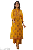 Yellow gold print Palazzo set with kurta and rayon fabric for women's fashion, three-quarter sleeves, printed net pattern on display. (India)