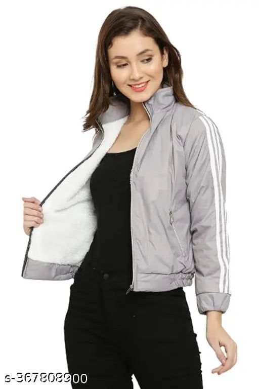 Warm, trendy women's full-fur polyester jacket in solid fleece fabric, perfect for winter wear with round neck and zip closer. Full sleeve, hooded style