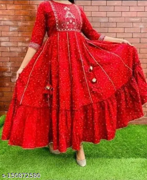 Women's long red anarkali gown with detailed embroidery