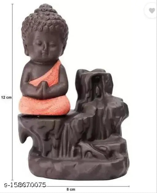 Handcrafted monk orange poly resin Buddha incense holder with backflow cone and 10 incense cones. Artistic waterfall smoke effect perfect for home decor