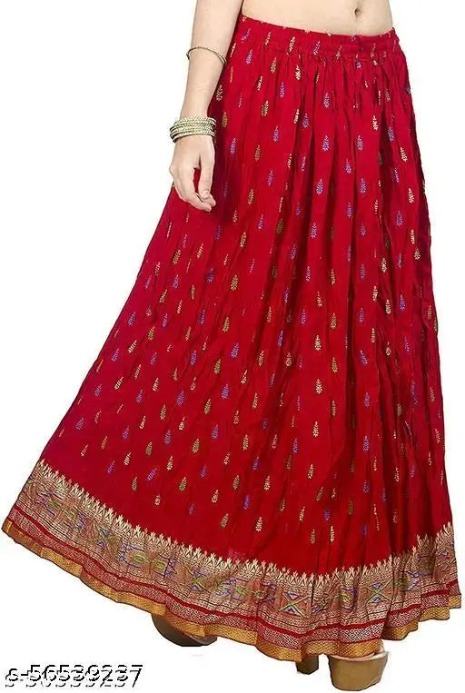 Red embroidered skirt with golden border, designed for computer work