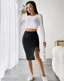 Black pencil skirt, black crop top, white sneakers