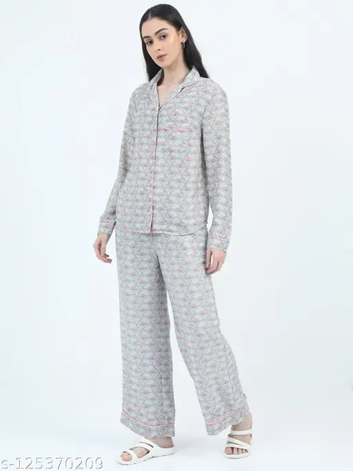 Grey loose-fit full sleeve button-down top with elastic closure pajama set, features printed net design, polyester fabric for top and pyjamas bottoms, suitable for women's nightwear in sizes XS to XXXXL