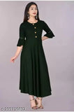 A woman wearing a dark green rayon kameez with short sleeves and a button closure