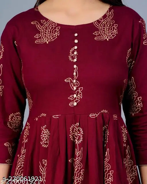 Stylish rayon long gold print kurti with embroidered pattern, perfect for ethnic wear. Three-quarter sleeves in sizes S (36in bust, 46in length), M (38in bust, 42in length), L (40in bust, 42in length), XXXL (46in bust, 42in length). Made in India