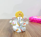 Handcrafted white gold polyresin Ganesh idol statue, 8cm tall. Modern, spiritual home decor with detailed craftsmanship from Kunti Craft. Ideal for cars, homes, and offices. Made in India
