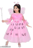 Pink tulle dress with fairy wings and wand