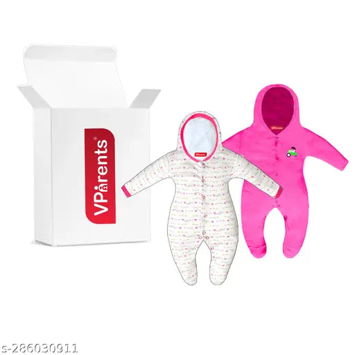 Purple and pink footie pajamas in a box