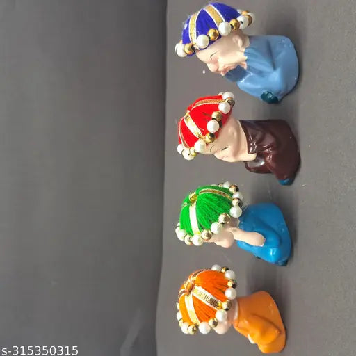 Multi-colored Alaukik polyresin baby Buddha monk idols (4 pcs) - Indian home decor for peaceful vibes