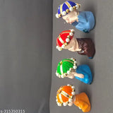 Multi-colored Alaukik polyresin baby Buddha monk idols (4 pcs) - Indian home decor for peaceful vibes
