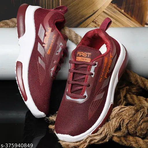 Red and white sports running shoes with black laces for boys