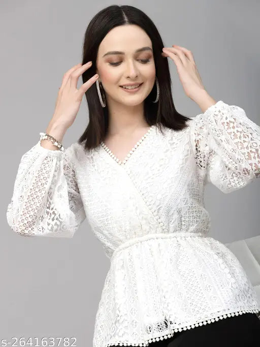 White cotton peplum top with long sleeves, V-neck, wrap style, lace fabric, self design, India