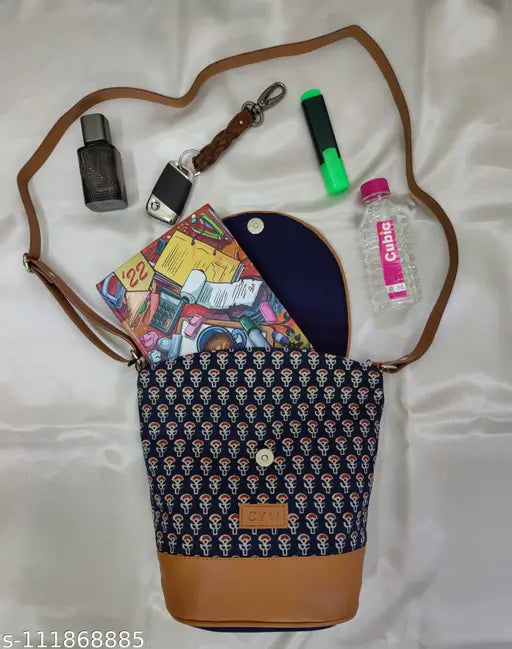 Cross body sling handbag with leather strap, blue patterned fabric, small card holder