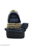A decorative, faux leather incense holder with a fountain-style spout, featuring a dark base and adorned with multiple cones in various states of use