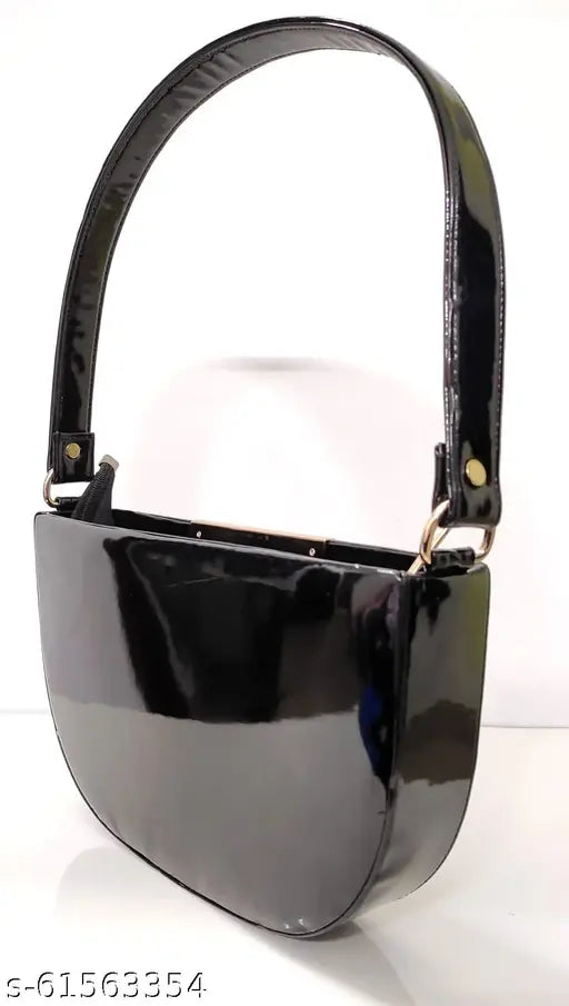 Black purse with a short shoulder strap