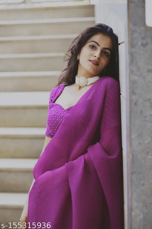 Purple chiffon pleated saree with sequined detail on blouse, sleeveless