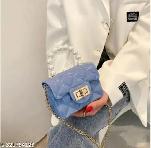 Blue jelly mini handbag for girls and women, washable and waterproof, sling style, likely clutch