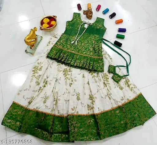 Cotton blend, printed botanical Swiss fabric skirt with front neck knot, double-stitched and fully lined. Made in India