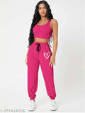 Pink cotton blend jogger pants with placement print, elevating casual athletic style from India