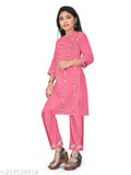 Baby pink Aari work kurti set, embellished straight palazzos with three-quarter sleeves, 7-8 years size, Indian fashion attire on mannequin