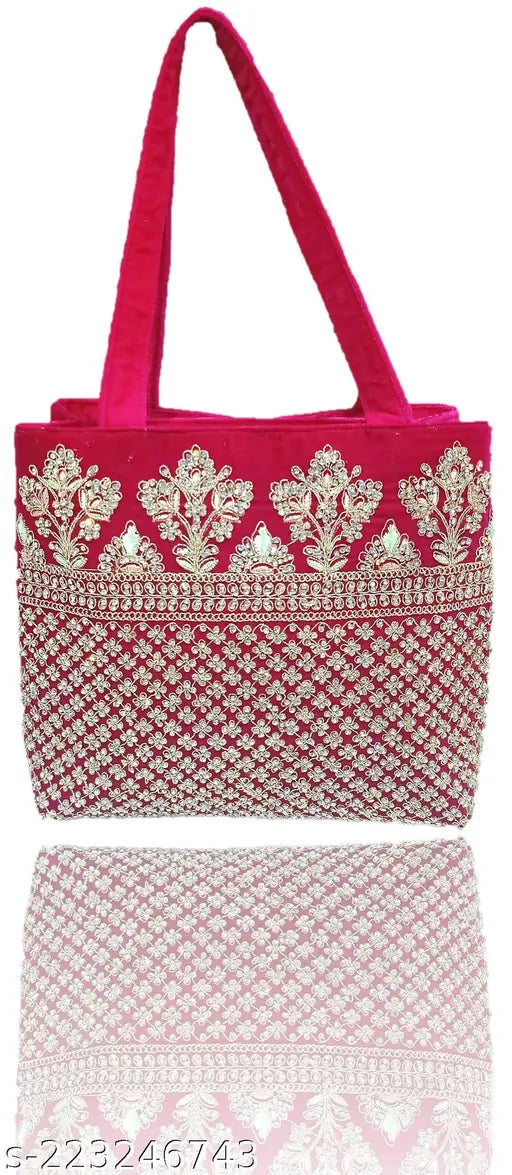 Soft velvet party handbag with intricate embroidery, suitable for weddings and special occasions