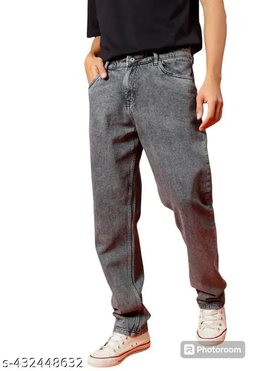 A man wearing a black t-shirt and blue jeans